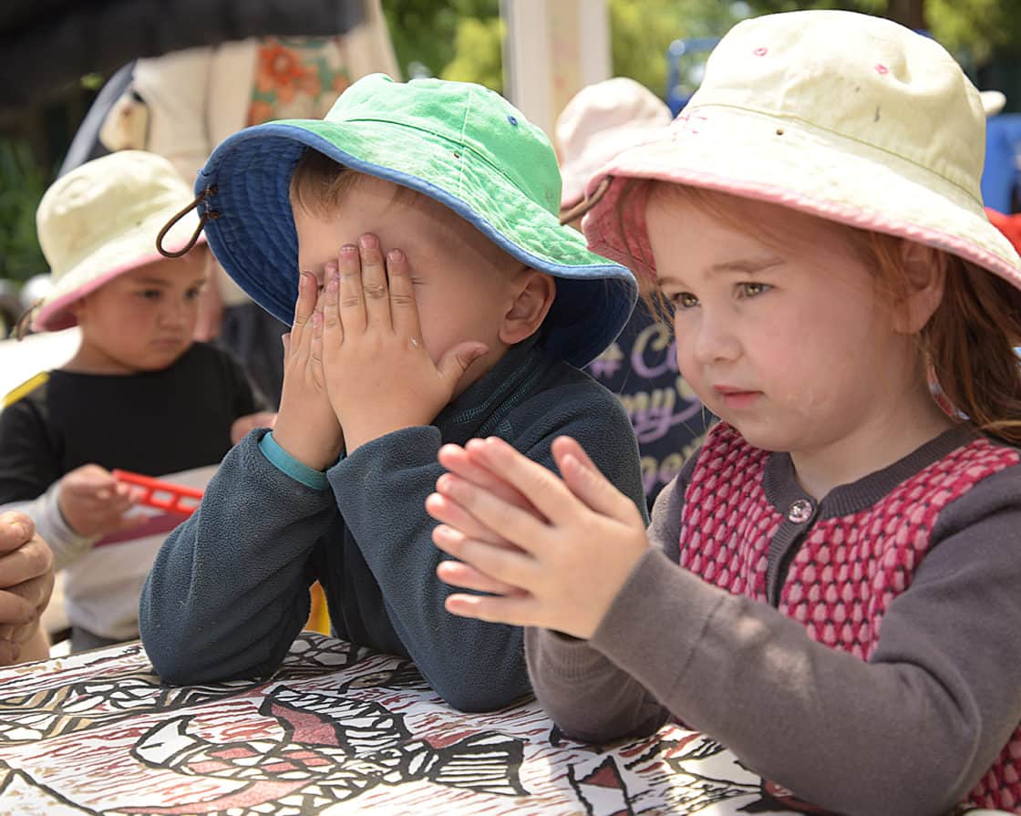 Charlotte MacDonald and Max Motornyi Kidsfirst Kindergarten Hoon Hay - hats on now sunscreen