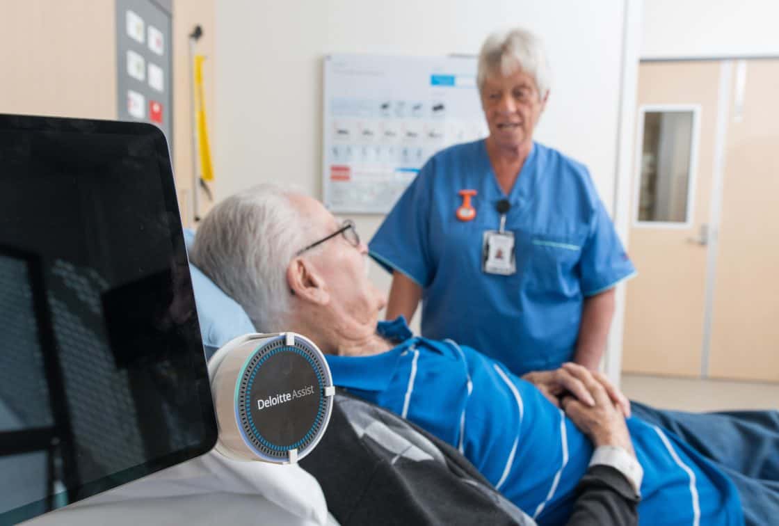 A Burwood Hospital nurse, right, with orthopaedic rehab patient Neil Milne during testing of a new voice-activated patient call system.